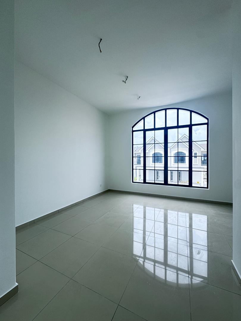 Bedroom with arched feature window