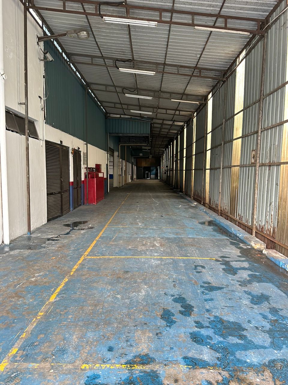 Covered access lane inside the factory compound